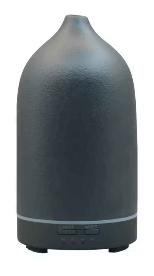Stylish ultrasonic aromatherapy diffuser with modern design for home or office relaxation.