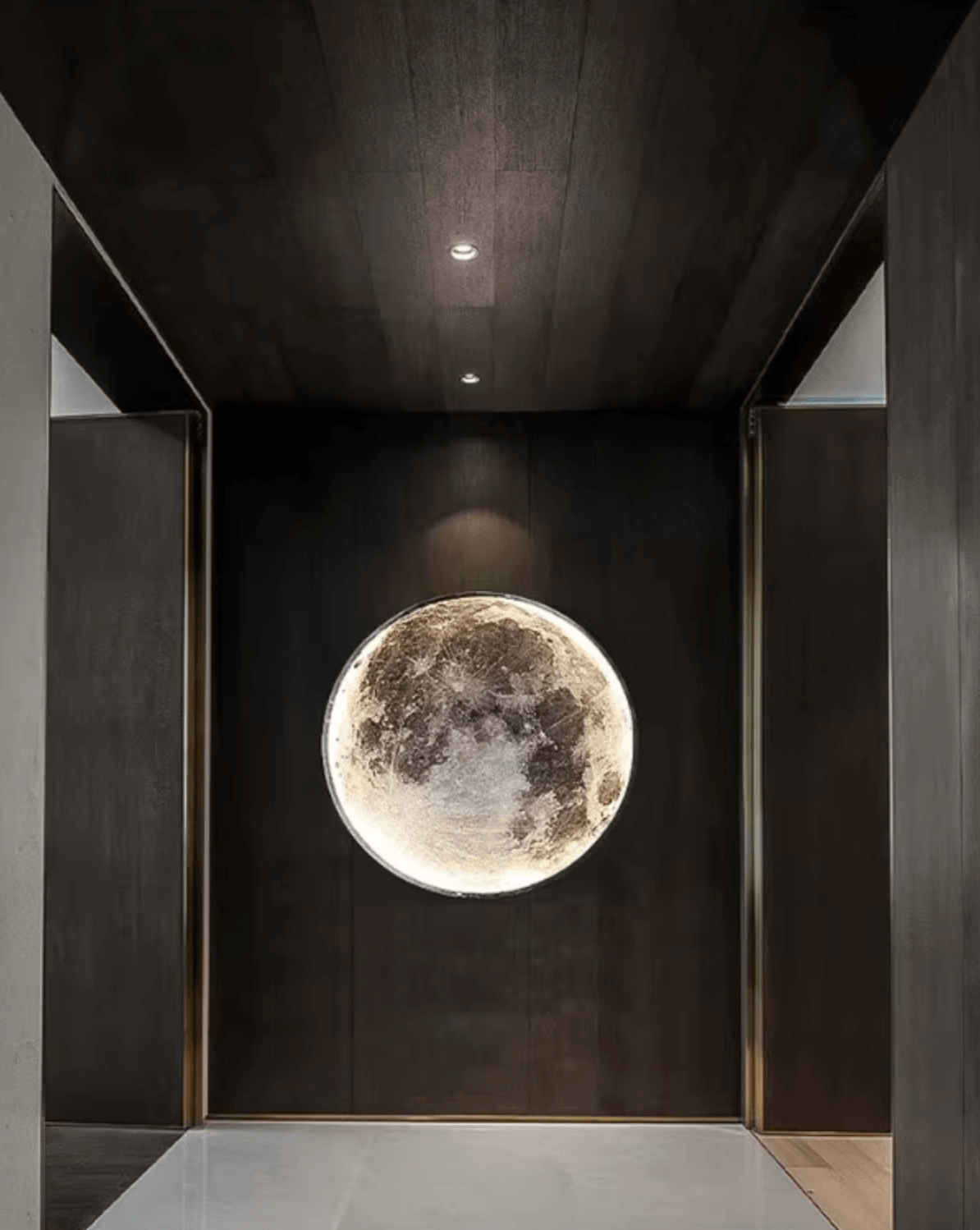 Moon Wall Light casting dimmable atmospheric moonlight on a modern interior wall, creating a magical nighttime ambiance.