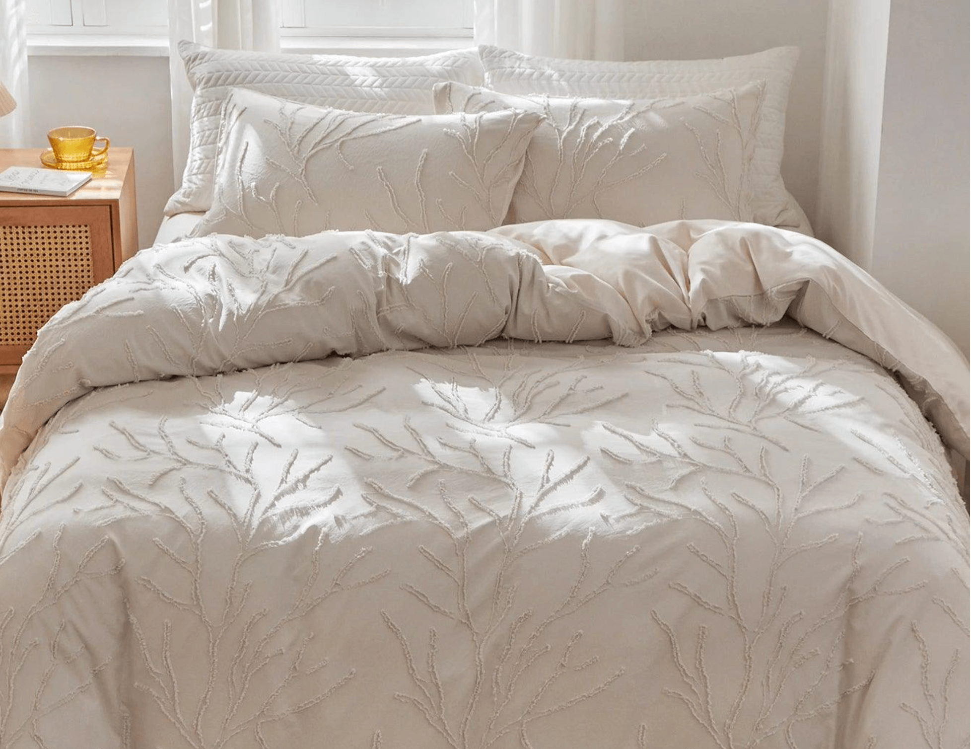 Boho-chic tufted bedding set with tree branch design in beige, enhancing bedroom style with natural elegance and comfort.
