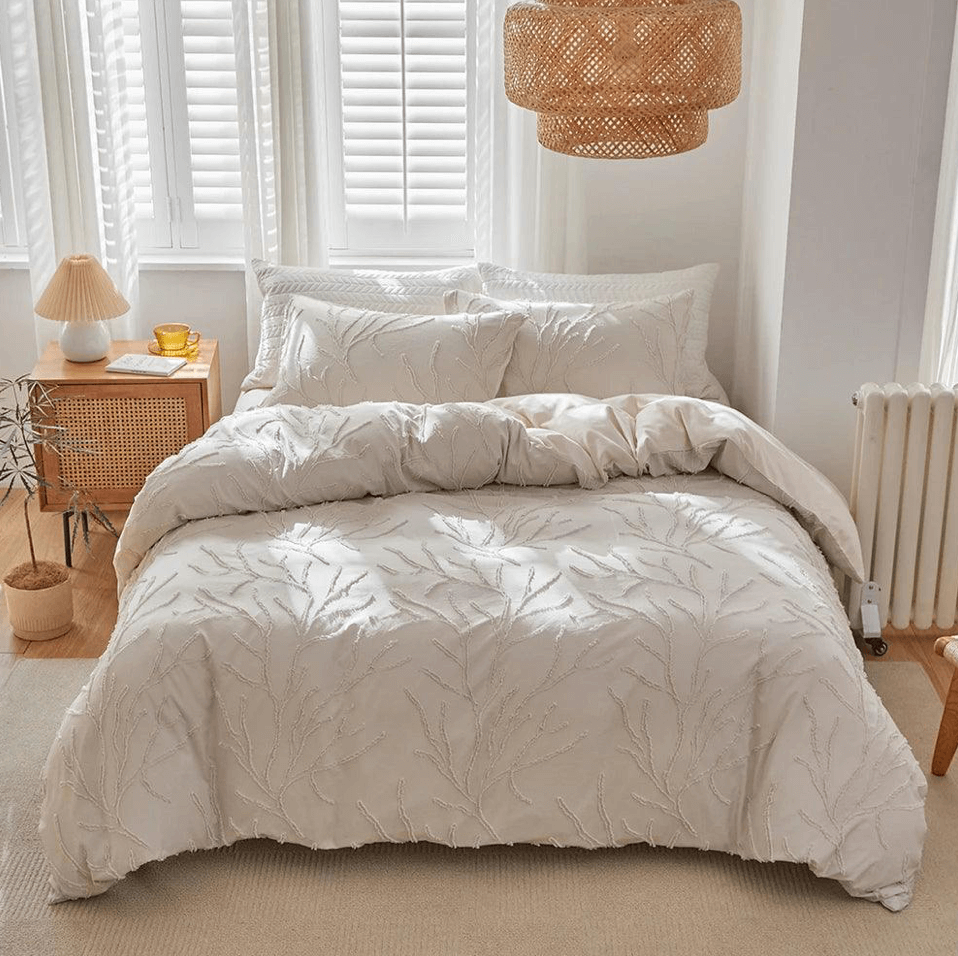 Boho chic tufted bedding set with tree branch design in beige, adding natural style to a modern bedroom.