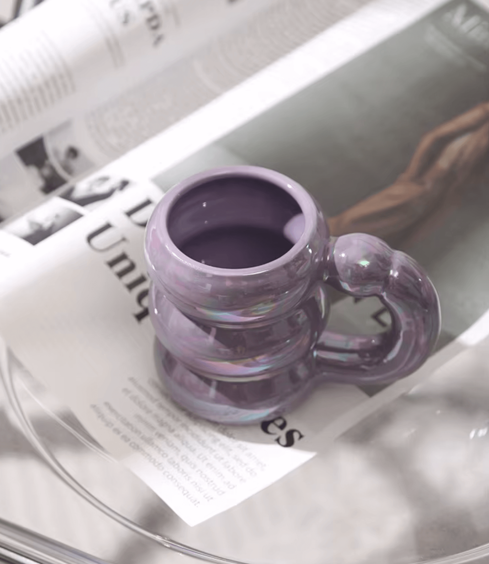 Purple ceramic Spring Bloom Tasse with Korean design on a magazine surface.