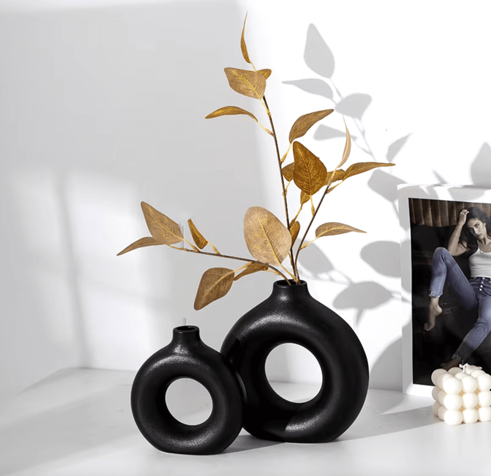 Nordic Vase Duo showcasing minimalist black design with gold branches, perfect for adding a touch of Scandinavian elegance to home decor.