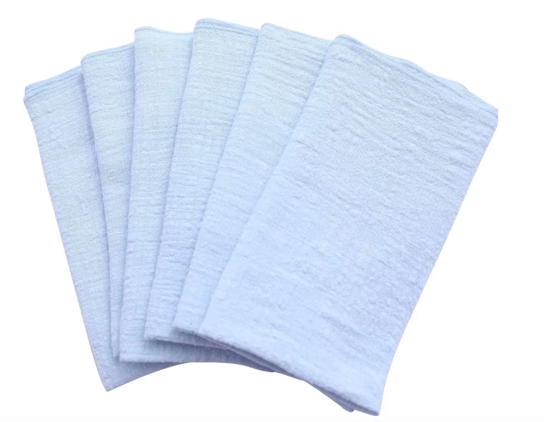 Set of elegant white cotton napkins for sustainable dining.