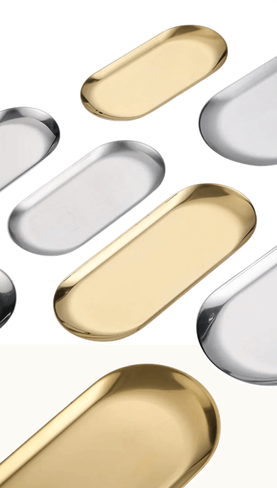 Gold and silver stainless steel trays showcasing minimalist luxury for table and decor use.