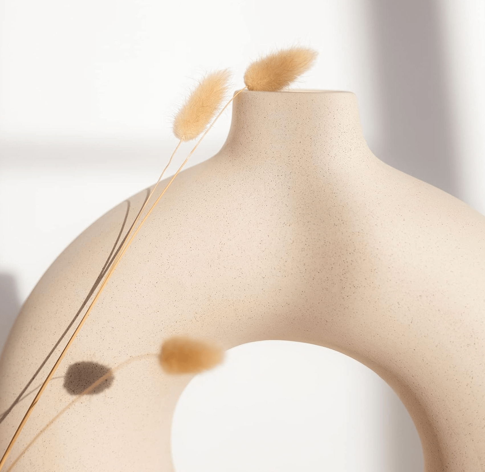 Nordic vase duo with minimalist design featuring dried branches, highlighting Scandinavian elegance and simplicity.