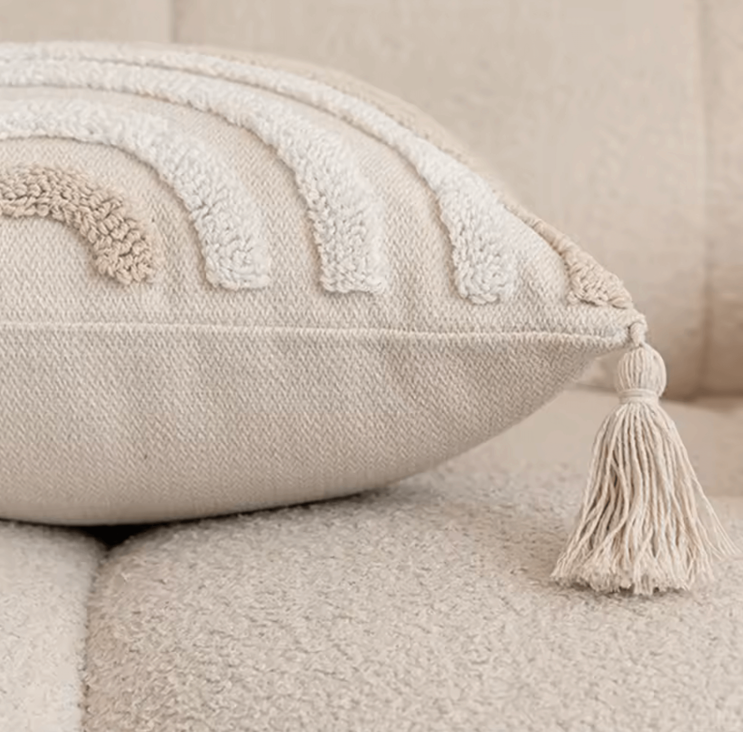 Boho beige pillow cover with geometric diamond tufting and tassels, handmade from 100% cotton, perfect for sofas or beds.