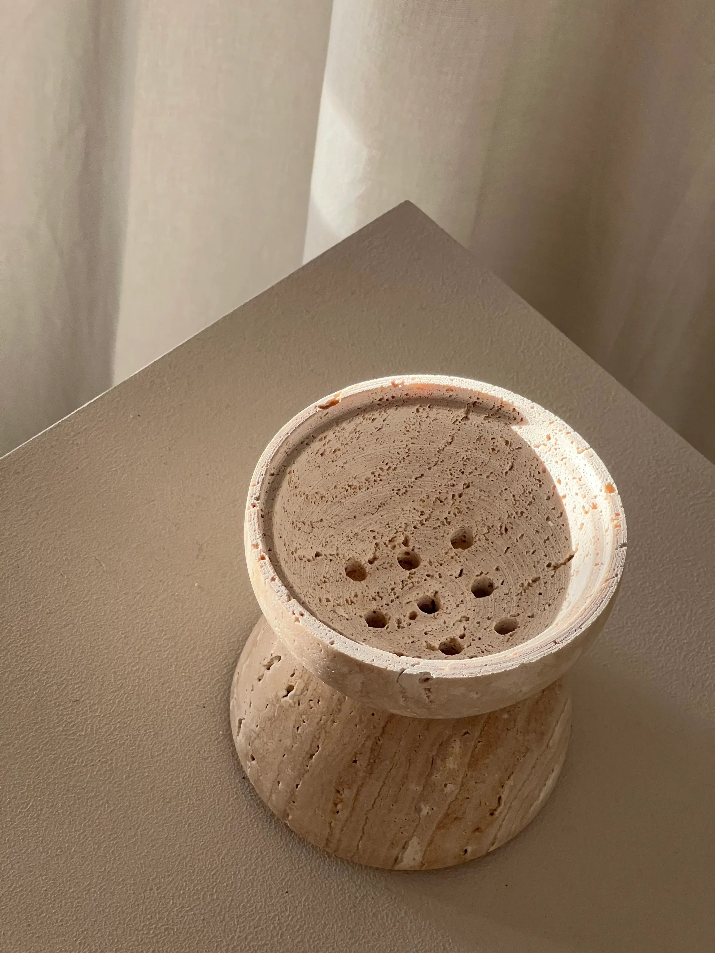 Handcrafted marble incense burner for rituals and relaxation.