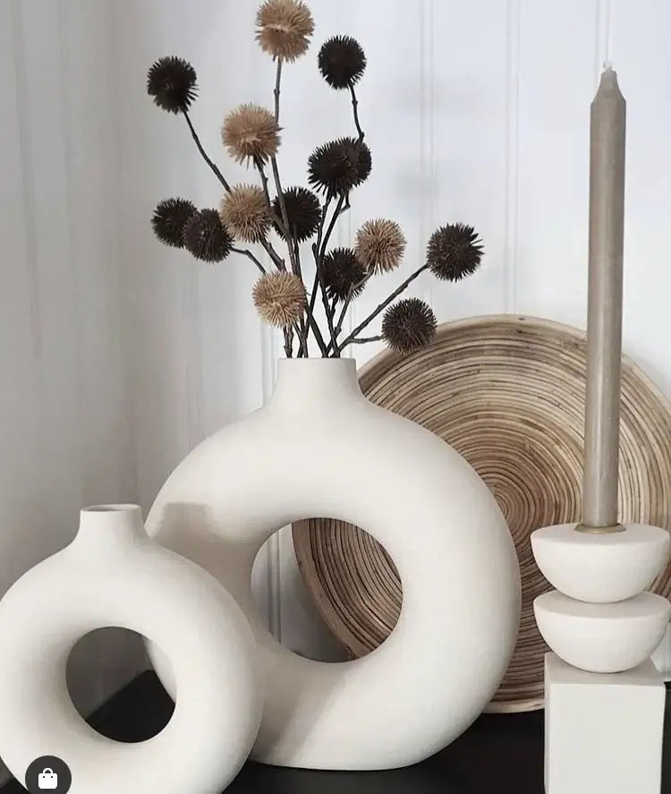 Nordic Vase Duo with minimalist design and dried flowers, showcasing timeless elegance and Scandinavian style on a modern tabletop.