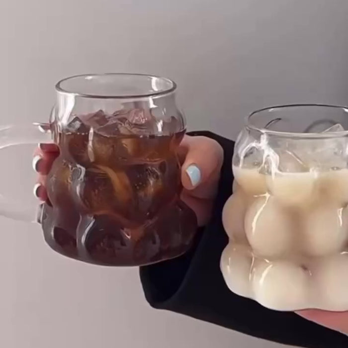 Two Glas-Tassen 'Pure Elegance' holding iced coffee and latte, showcasing stylish design and functionality for everyday elegant enjoyment.