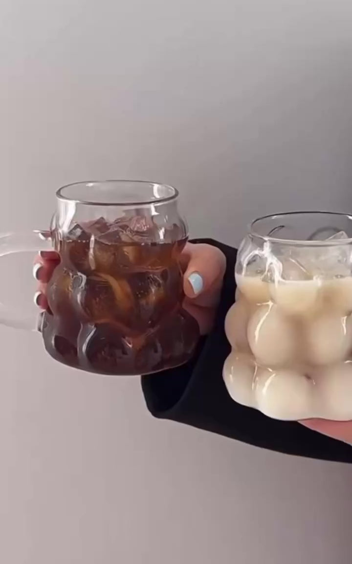 Two Glas-Tassen 'Pure Elegance' holding iced coffee and latte, showcasing stylish design and functionality for everyday elegant enjoyment.